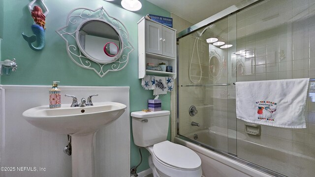21 Mid Pines Cir, Palm Coast, FL 32137 - bathroom featuring enclosed tub / shower combo and toilet