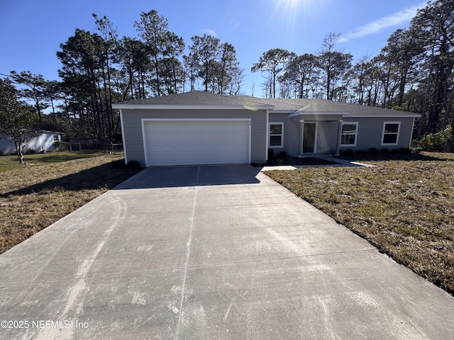 47 Laguna Forest Trl, Palm Coast, FL 32164 - ranch-style home with driveway, an attached garage, and a front yard