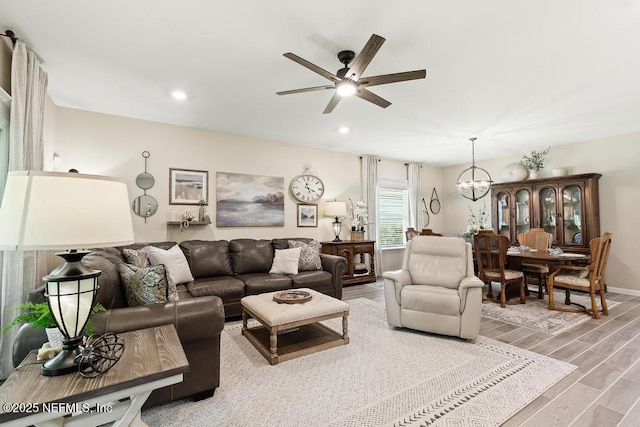 488 Montserrat Dr, Saint Augustine, FL 32092 - living room featuring ceiling fan, light wood-type flooring, a chandelier, and recessed lighting