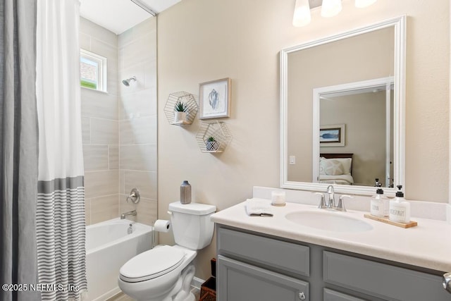488 Montserrat Dr, Saint Augustine, FL 32092 - ensuite bathroom featuring vanity, shower / bath combo with shower curtain, and toilet