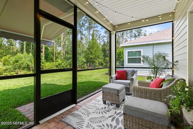 488 Montserrat Dr, Saint Augustine, FL 32092 - sunroom featuring rail lighting