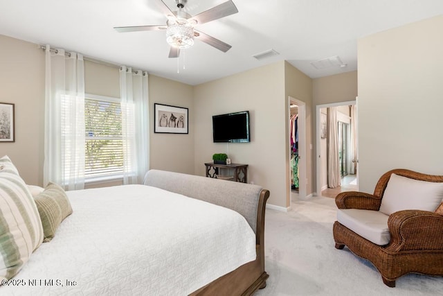 488 Montserrat Dr, Saint Augustine, FL 32092 - bedroom featuring light colored carpet, a spacious closet, ceiling fan, baseboards, and a closet