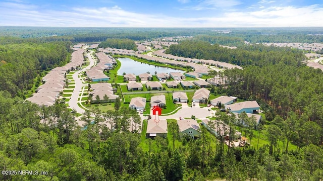 488 Montserrat Dr, Saint Augustine, FL 32092 - aerial perspective of suburban area with a forest and a large body of water