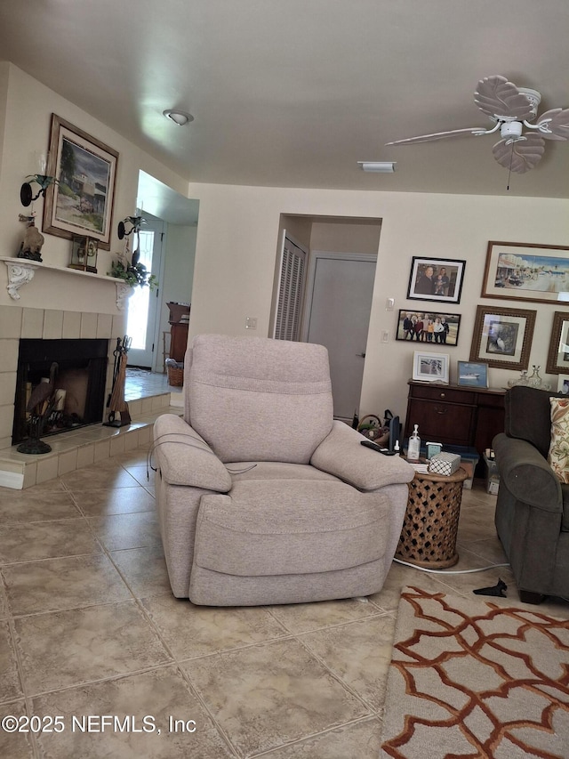 2770 Bordeaux Ct, Ponte Vedra Beach, FL 32082 - living room featuring a tiled fireplace and a ceiling fan
