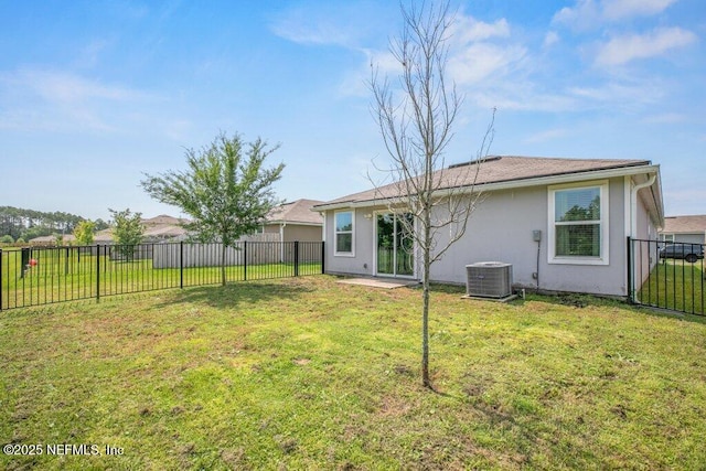 12097 Grand Herring Way, Jacksonville, FL 32219 - back of property featuring central air condition unit and stucco siding