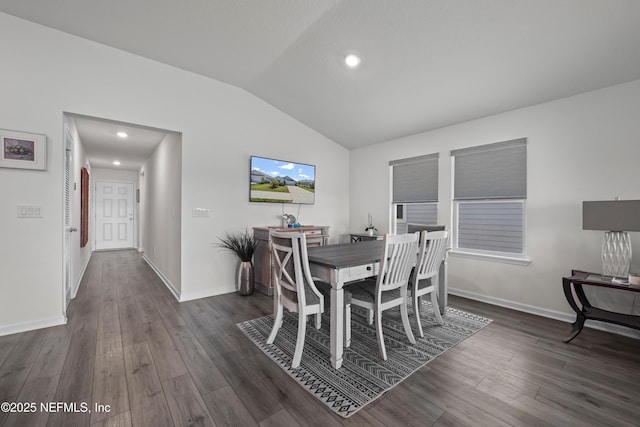 25 Windsor Ter, Palm Coast, FL 32164 - dining space featuring lofted ceiling, dark wood finished floors, baseboards, and recessed lighting
