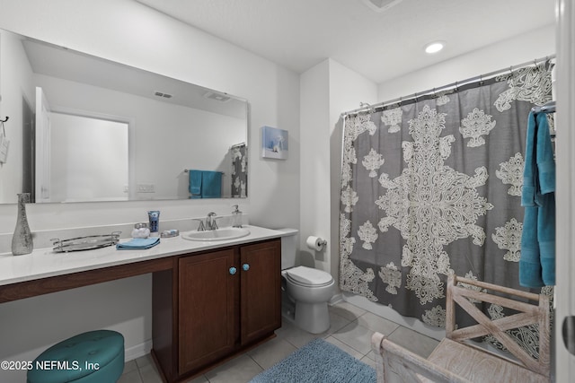 25 Windsor Ter, Palm Coast, FL 32164 - bathroom featuring toilet, tile patterned floors, vanity, and a shower with shower curtain