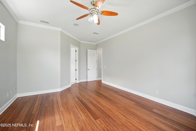 10065 Ecton Ln, Jacksonville, FL 32246 - unfurnished room with baseboards, wood finished floors, crown molding, and a ceiling fan