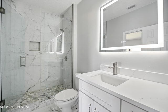 10065 Ecton Ln, Jacksonville, FL 32246 - bathroom with toilet, a marble finish shower, vanity, and marble finish floors