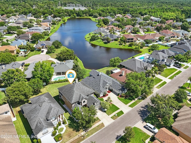 10065 Ecton Ln, Jacksonville, FL 32246 - aerial perspective of suburban area featuring a large body of water and a heavily wooded area