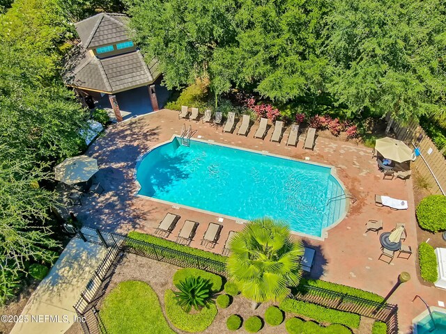 10065 Ecton Ln, Jacksonville, FL 32246 - community pool with a patio