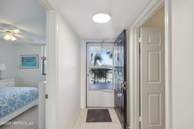 3360 Ocean Shore Blvd Unit 3070, Ormond Beach, FL 32176 - hallway with light tile patterned floors and baseboards