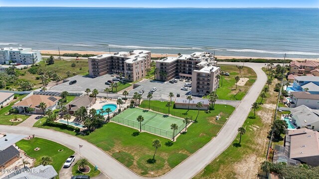 3360 Ocean Shore Blvd Unit 3070, Ormond Beach, FL 32176 - bird's eye view of waterfront with a beach, a pool, and apartment complex