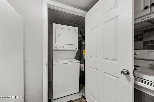 8615 2nd Ave, Jacksonville, FL 32208 - laundry area featuring stacked washer and clothes dryer