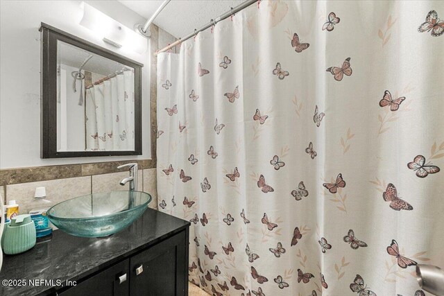 8615 2nd Ave, Jacksonville, FL 32208 - bathroom featuring vanity, curtained shower, and tile walls