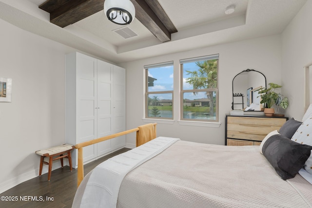 263 Forest Spring Dr, Ponte Vedra, FL 32081 - bedroom with dark wood-style floors, beam ceiling, baseboards, and a closet