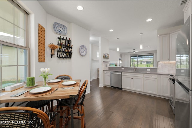 263 Forest Spring Dr, Ponte Vedra, FL 32081 - dining area with dark wood-style flooring, recessed lighting, a ceiling fan, and baseboards