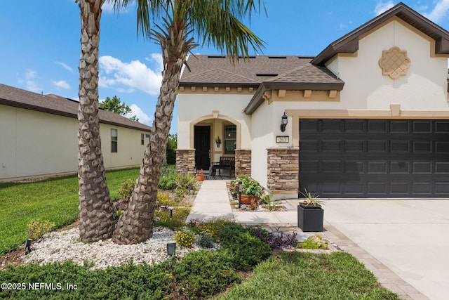 263 Forest Spring Dr, Ponte Vedra, FL 32081 - view of front of home featuring stucco siding, an attached garage, driveway, roof with shingles, and stone siding