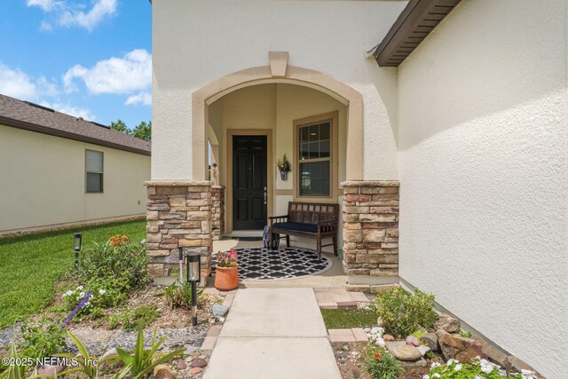 263 Forest Spring Dr, Ponte Vedra, FL 32081 - doorway to property featuring stone siding and stucco siding