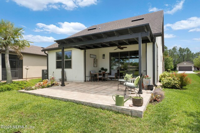 263 Forest Spring Dr, Ponte Vedra, FL 32081 - back of house with a yard, ceiling fan, a patio area, and a shingled roof