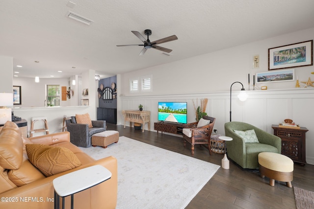 263 Forest Spring Dr, Ponte Vedra, FL 32081 - living room featuring wood finished floors, a ceiling fan, a wainscoted wall, recessed lighting, and a decorative wall