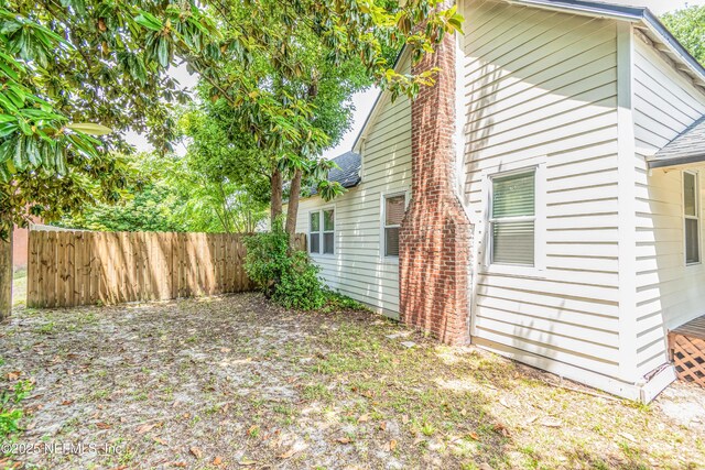 148 N 4th St, Macclenny, FL 32063 - view of property exterior with a shingled roof