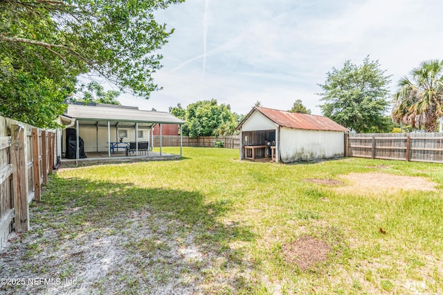 148 N 4th St, Macclenny, FL 32063 - view of yard with an outbuilding and a patio