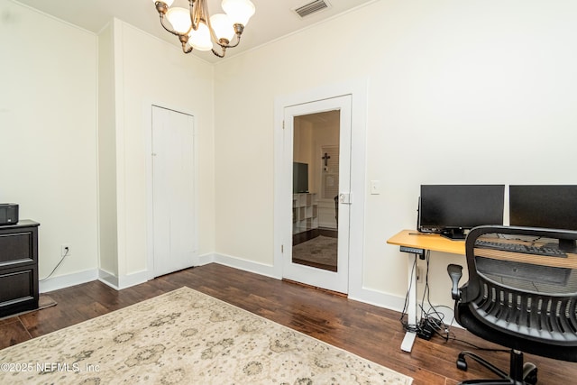 148 N 4th St, Macclenny, FL 32063 - office featuring a chandelier, wood finished floors, and baseboards