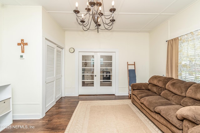 148 N 4th St, Macclenny, FL 32063 - living area with a chandelier, wood finished floors, and baseboards