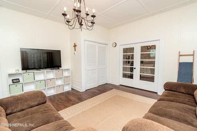 148 N 4th St, Macclenny, FL 32063 - living room with wood finished floors and a chandelier