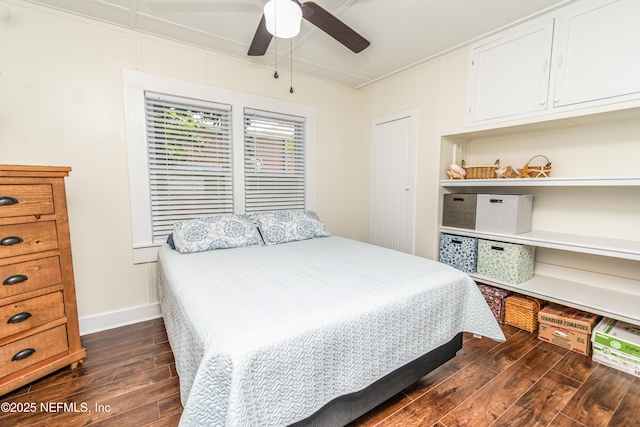 148 N 4th St, Macclenny, FL 32063 - bedroom with dark wood-style flooring, ceiling fan, baseboards, and ornamental molding
