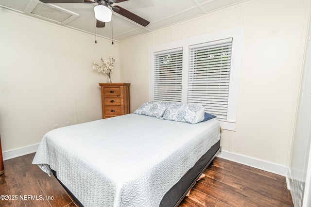 148 N 4th St, Macclenny, FL 32063 - bedroom with dark wood-type flooring, baseboards, and ceiling fan