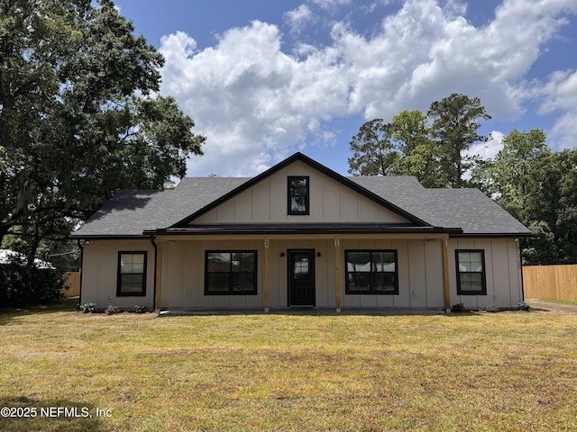 37280 New Oak St, Hilliard, FL 32046 - modern inspired farmhouse with roof with shingles, covered porch, and board and batten siding