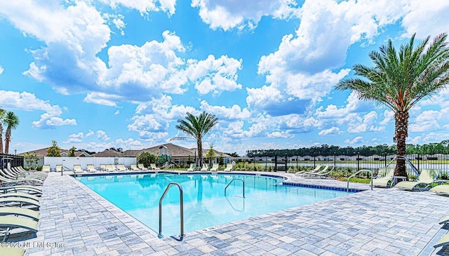 7242 Calamint Ave, Jacksonville, FL 32219 - community pool featuring a patio