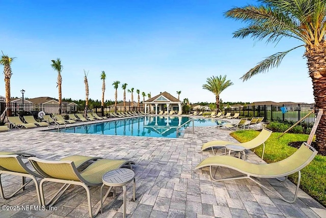 7242 Calamint Ave, Jacksonville, FL 32219 - community pool featuring a patio