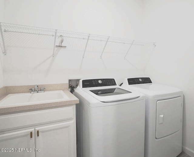 7242 Calamint Ave, Jacksonville, FL 32219 - laundry area with separate washer and dryer and cabinet space