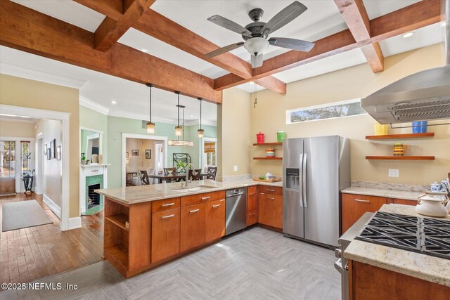 24 Sevilla St, Saint Augustine, FL 32084 - kitchen featuring open shelves, stainless steel appliances, a peninsula, a sink, and brown cabinetry