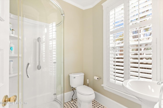 24 Sevilla St, Saint Augustine, FL 32084 - full bathroom with a shower stall, baseboards, toilet, crown molding, and tile patterned flooring