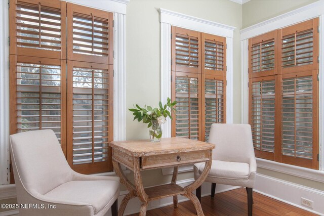 24 Sevilla St, Saint Augustine, FL 32084 - sitting room featuring wood finished floors and baseboards