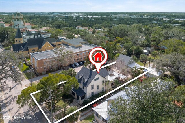 24 Sevilla St, Saint Augustine, FL 32084 - aerial view of property's location with nearby suburban area and property parcel outlined