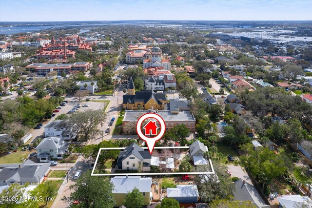 24 Sevilla St, Saint Augustine, FL 32084 - aerial view of property's location with property boundaries highlighted and nearby suburban area