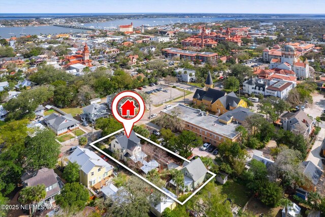 24 Sevilla St, Saint Augustine, FL 32084 - aerial view of property and surrounding area featuring a large body of water and property parcel outlined