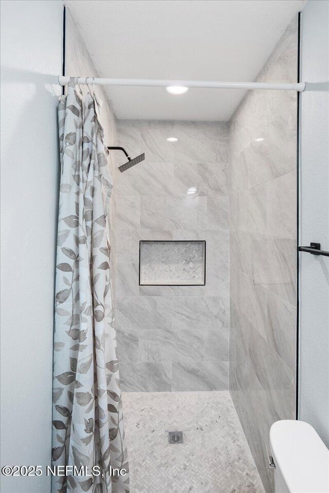 619 S 10th St, Fernandina Beach, FL 32034 - bathroom with a stall shower and toilet