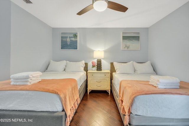 1113 Lee Rd, Jacksonville, FL 32225 - bedroom with dark wood-style flooring and a ceiling fan