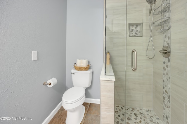 1113 Lee Rd, Jacksonville, FL 32225 - bathroom featuring a shower stall, toilet, and baseboards