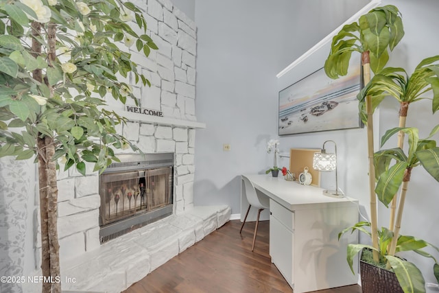1113 Lee Rd, Jacksonville, FL 32225 - living room with a fireplace, wood finished floors, and baseboards