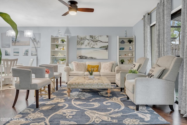 1113 Lee Rd, Jacksonville, FL 32225 - living area with wood finished floors and ceiling fan