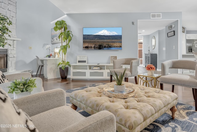 1113 Lee Rd, Jacksonville, FL 32225 - living area featuring wood finished floors and a fireplace