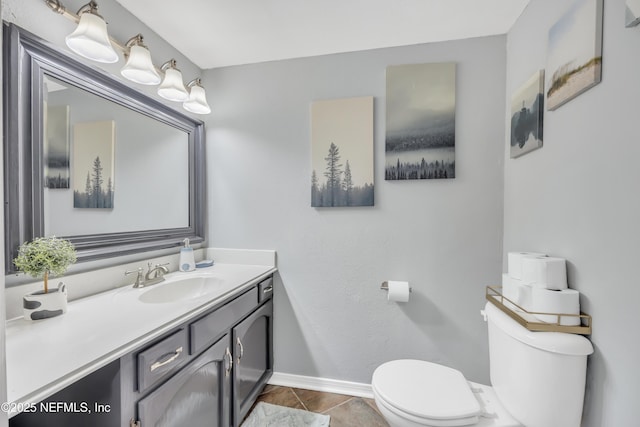 1113 Lee Rd, Jacksonville, FL 32225 - bathroom featuring toilet, baseboards, and vanity