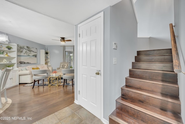 1113 Lee Rd, Jacksonville, FL 32225 - stairs with a ceiling fan